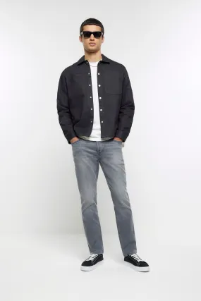 River Island - Vestibilità attillata / Slim Jeans svasato